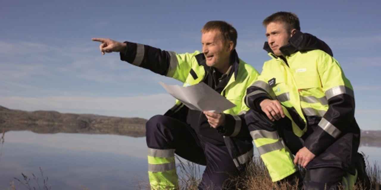 Employees pointing forwards